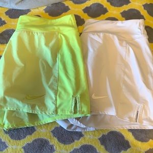 2 pairs of nike shorts lime green and white